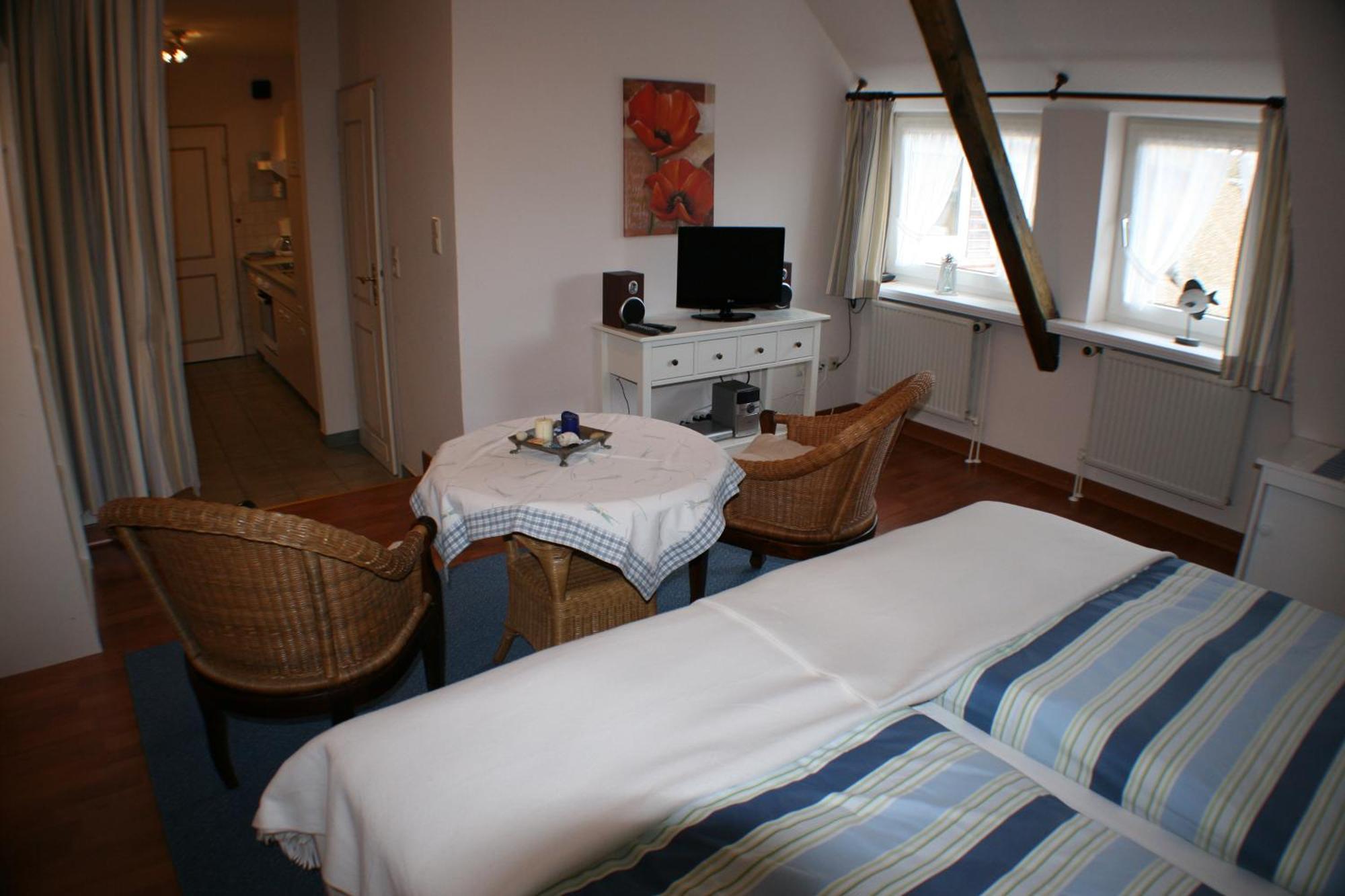 Ferienwohnungen Im Hotel Garni Zur Post Utersum Rum bild